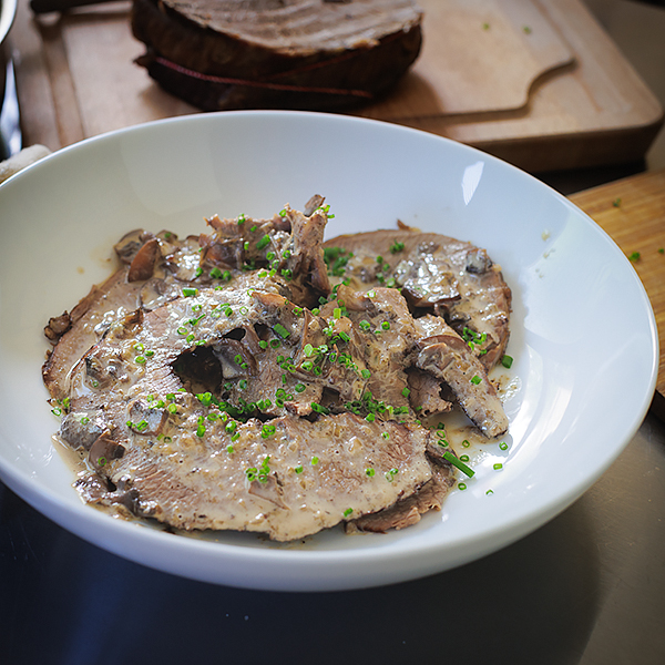 Slow Braised Beef Brisket Drenched in Cheese Mushroom Sauce